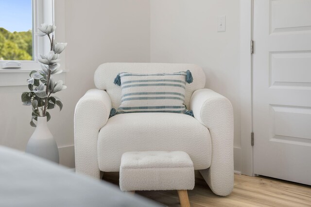 sitting room featuring wood finished floors