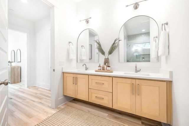 174 Grande Pointe Cir, Inlet Beach, FL 32461 - full bath with double vanity, a shower with door, and wood finished floors