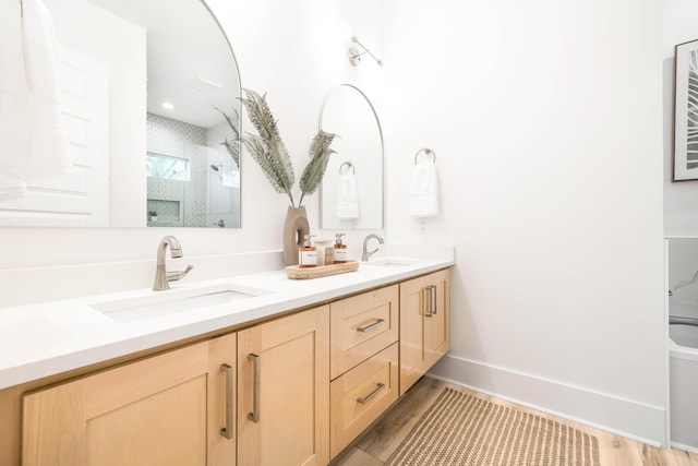 174 Grande Pointe Cir, Inlet Beach, FL 32461 - full bath with double vanity, a shower, and wood finished floors
