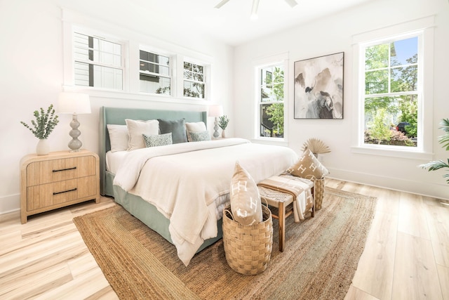 174 Grande Pointe Cir, Inlet Beach, FL 32461 - bedroom with light wood-style floors and ceiling fan