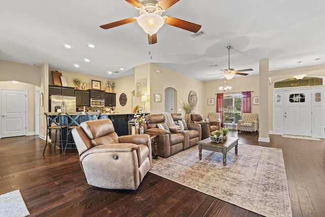 living room with recessed lighting, arched walkways, dark wood-style flooring, and a ceiling fan