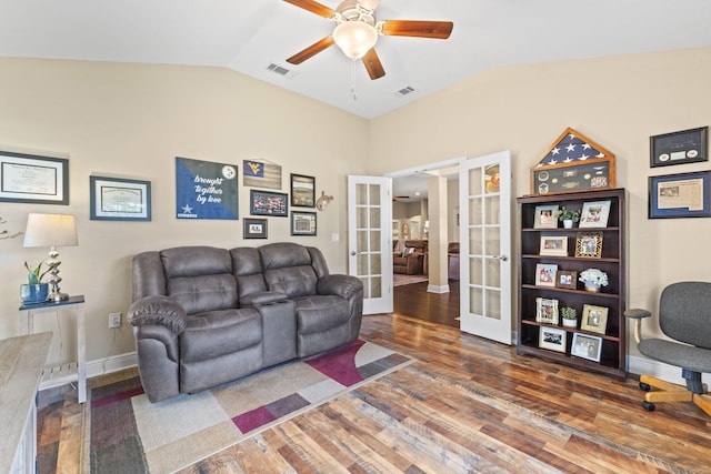 living room with french doors, a ceiling fan, vaulted ceiling, and visible vents