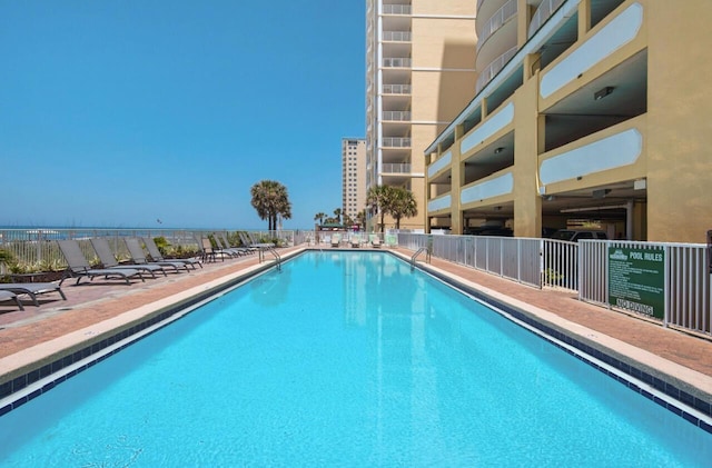 10519 Front Beach Rd Unit 1802B, Panama City Beach, FL 32407 - pool featuring fence and a patio