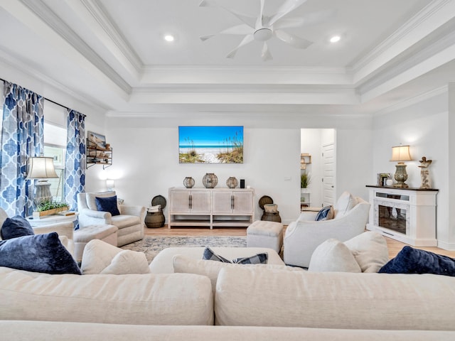 183 Pine Lake Dr, Santa Rosa Beach, FL 32459 - living area with ornamental molding, wood finished floors, and a raised ceiling