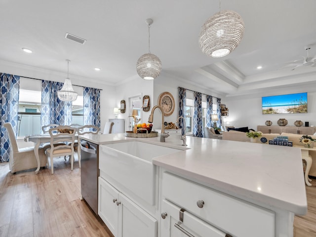 183 Pine Lake Dr, Santa Rosa Beach, FL 32459 - kitchen featuring a sink, ornamental molding, dishwasher, and open floor plan