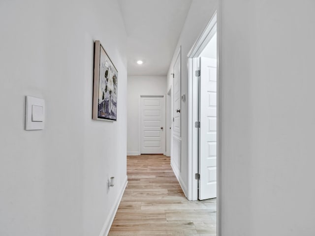 183 Pine Lake Dr, Santa Rosa Beach, FL 32459 - hall featuring recessed lighting, baseboards, and light wood-style flooring