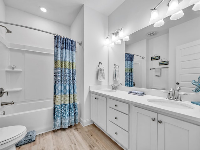 183 Pine Lake Dr, Santa Rosa Beach, FL 32459 - bathroom with a sink, shower / bathtub combination with curtain, and toilet