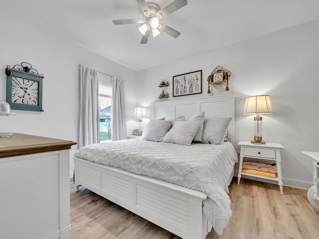 183 Pine Lake Dr, Santa Rosa Beach, FL 32459 - bedroom featuring baseboards, ceiling fan, and light wood-type flooring