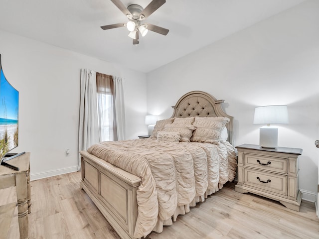 183 Pine Lake Dr, Santa Rosa Beach, FL 32459 - bedroom with baseboards, ceiling fan, and light wood-style flooring
