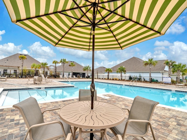 183 Pine Lake Dr, Santa Rosa Beach, FL 32459 - pool with a patio area and fence
