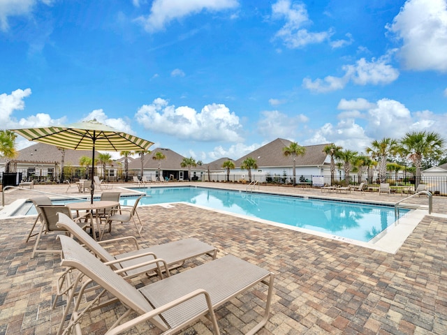 183 Pine Lake Dr, Santa Rosa Beach, FL 32459 - pool with a patio and fence