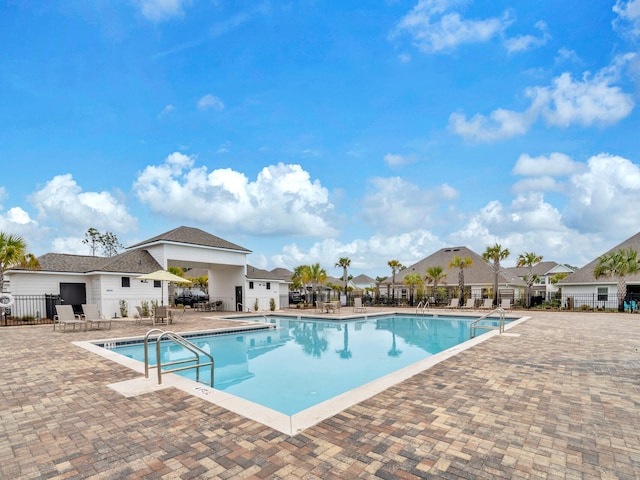 183 Pine Lake Dr, Santa Rosa Beach, FL 32459 - pool with fence, a residential view, and a patio area