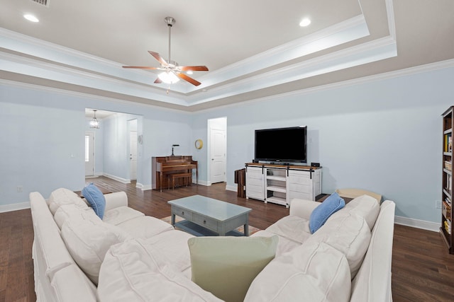 672 Alderberry Rd, Santa Rosa Beach, FL 32459 - living area featuring baseboards, a tray ceiling, ornamental molding, and ceiling fan