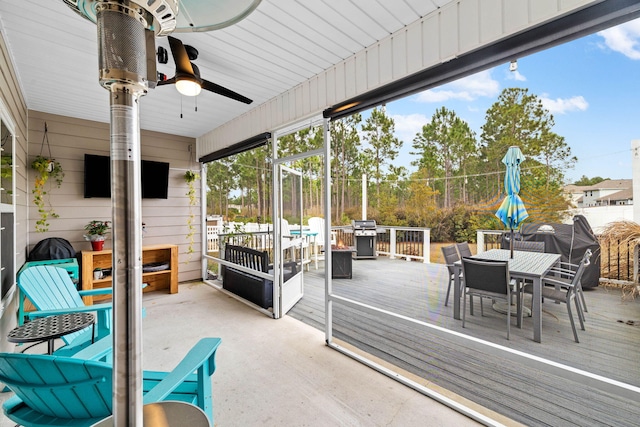 672 Alderberry Rd, Santa Rosa Beach, FL 32459 - sunroom / solarium with outdoor dining area and ceiling fan