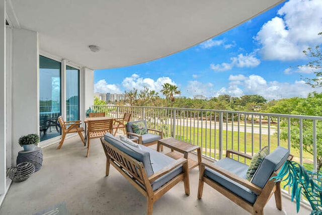 balcony featuring an outdoor living space