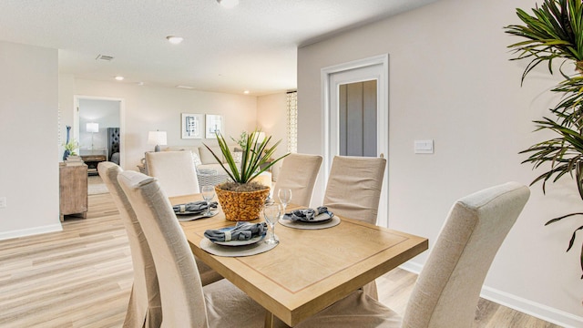 3074 Heritage Plantation Blvd, Laurel Hill, FL 32567 - dining room featuring light wood-type flooring, recessed lighting, baseboards, and visible vents