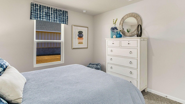 3074 Heritage Plantation Blvd, Laurel Hill, FL 32567 - bedroom with baseboards and carpet flooring