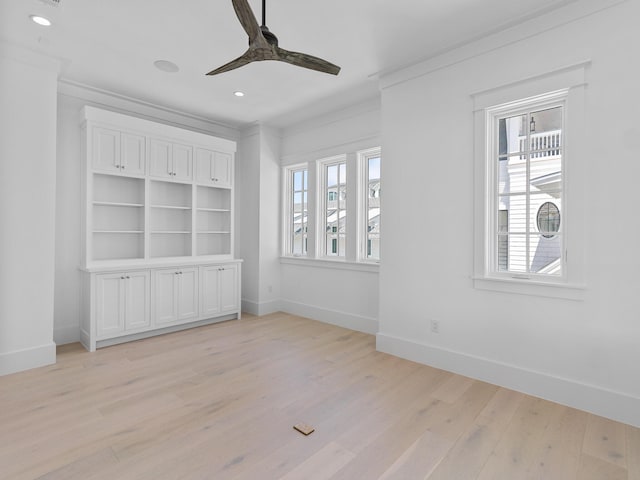 unfurnished bedroom with light wood-style floors, ornamental molding, baseboards, and recessed lighting