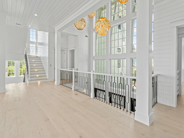 unfurnished sunroom featuring an inviting chandelier