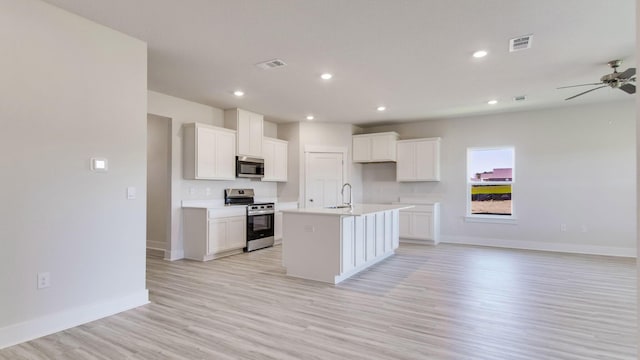 3068 Heritage Plantation Blvd, Laurel Hill, FL 32567 - kitchen featuring a sink, appliances with stainless steel finishes, baseboards, and open floor plan
