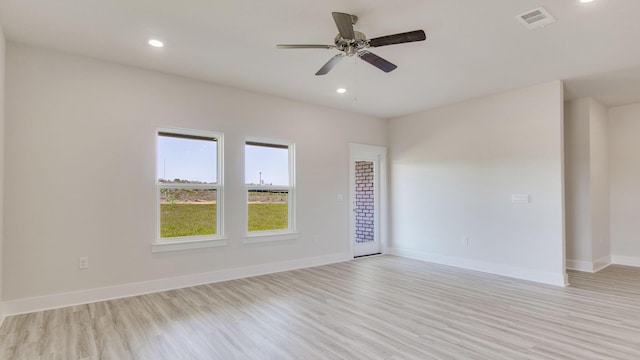 3068 Heritage Plantation Blvd, Laurel Hill, FL 32567 - unfurnished room featuring baseboards, visible vents, ceiling fan, and light wood-type flooring