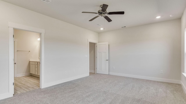3068 Heritage Plantation Blvd, Laurel Hill, FL 32567 - unfurnished bedroom with baseboards, recessed lighting, ensuite bath, and light carpet