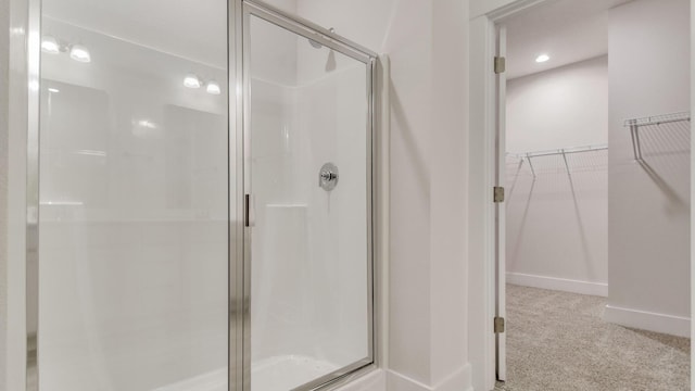 3068 Heritage Plantation Blvd, Laurel Hill, FL 32567 - full bathroom with baseboards, a shower stall, recessed lighting, and a spacious closet