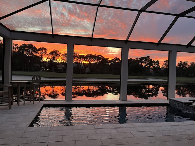 489 Regatta Bay Blvd, Destin, FL 32541 - view of patio / terrace with glass enclosure, an outdoor hot tub, and an outdoor pool
