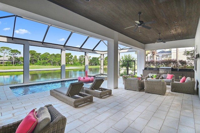 489 Regatta Bay Blvd, Destin, FL 32541 - view of patio with area for grilling, an outdoor hangout area, a water view, a ceiling fan, and glass enclosure