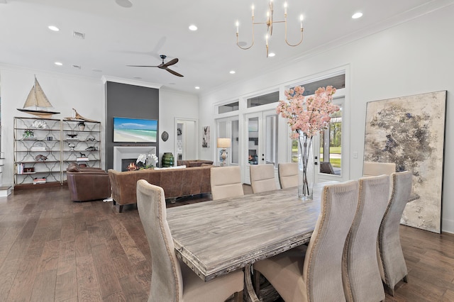 489 Regatta Bay Blvd, Destin, FL 32541 - dining room featuring ornamental molding, dark wood-style floors, recessed lighting, a chandelier, and a ceiling fan