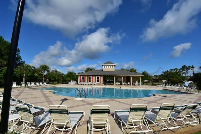 community pool with a patio