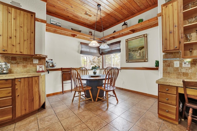 35 Blue Bayou Dr, Santa Rosa Beach, FL 32459 - dining area featuring wood ceiling, light tile patterned flooring, an office area, and baseboards
