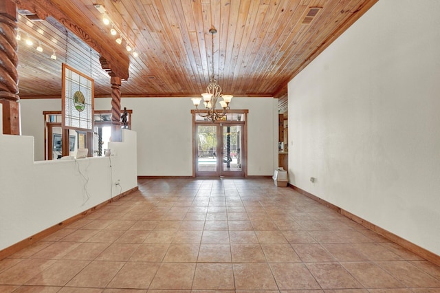 35 Blue Bayou Dr, Santa Rosa Beach, FL 32459 - unfurnished room with wooden ceiling, a chandelier, light tile patterned floors, crown molding, and baseboards