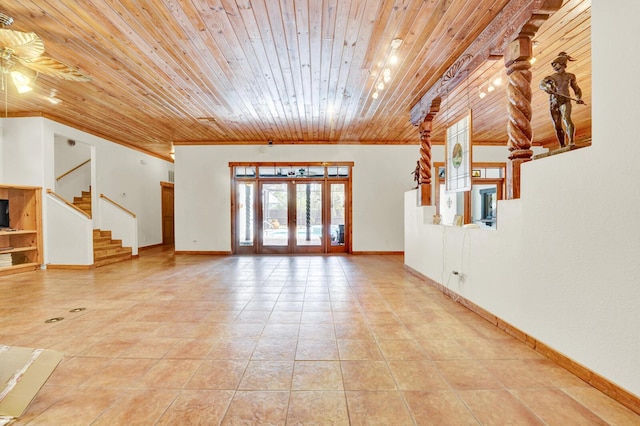 35 Blue Bayou Dr, Santa Rosa Beach, FL 32459 - unfurnished living room featuring wood ceiling, stairway, light tile patterned flooring, baseboards, and ceiling fan