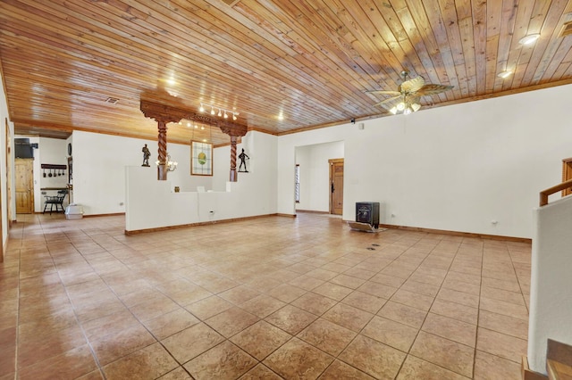 35 Blue Bayou Dr, Santa Rosa Beach, FL 32459 - unfurnished living room featuring tile patterned floors, wood ceiling, ceiling fan, and crown molding