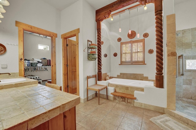 35 Blue Bayou Dr, Santa Rosa Beach, FL 32459 - full bathroom with a shower stall, healthy amount of natural light, tile patterned floors, and a garden tub