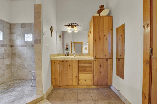 35 Blue Bayou Dr, Santa Rosa Beach, FL 32459 - full bathroom with walk in shower, vanity, tile patterned floors, and baseboards