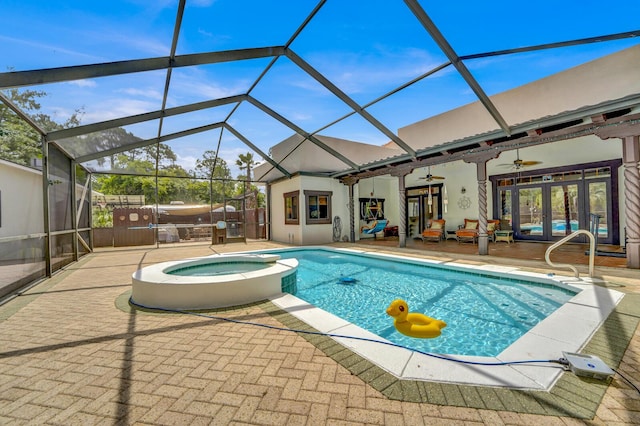35 Blue Bayou Dr, Santa Rosa Beach, FL 32459 - view of pool with a patio area, a ceiling fan, french doors, a pool with connected hot tub, and glass enclosure