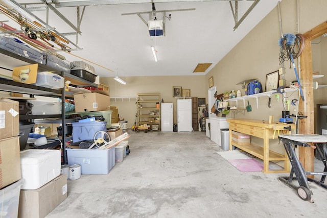35 Blue Bayou Dr, Santa Rosa Beach, FL 32459 - garage featuring a workshop area and a garage door opener