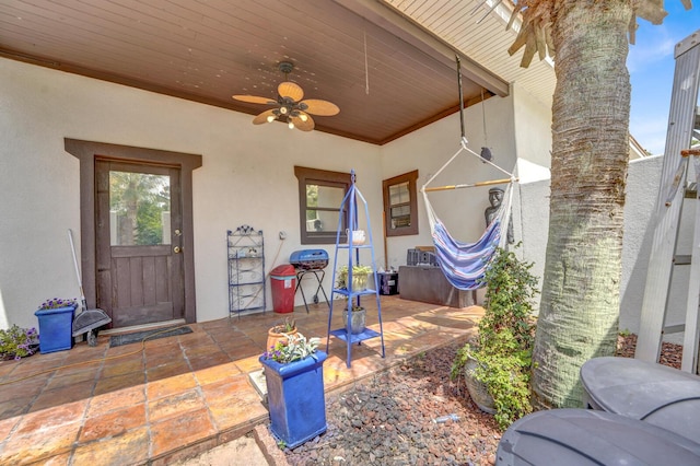 35 Blue Bayou Dr, Santa Rosa Beach, FL 32459 - doorway to property with stucco siding, a patio, and ceiling fan