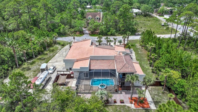 35 Blue Bayou Dr, Santa Rosa Beach, FL 32459 - view of subject property featuring a pool and a heavily wooded area