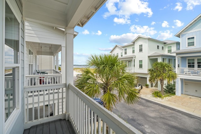 balcony featuring a residential view