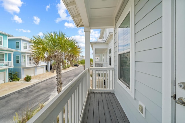 balcony featuring a residential view