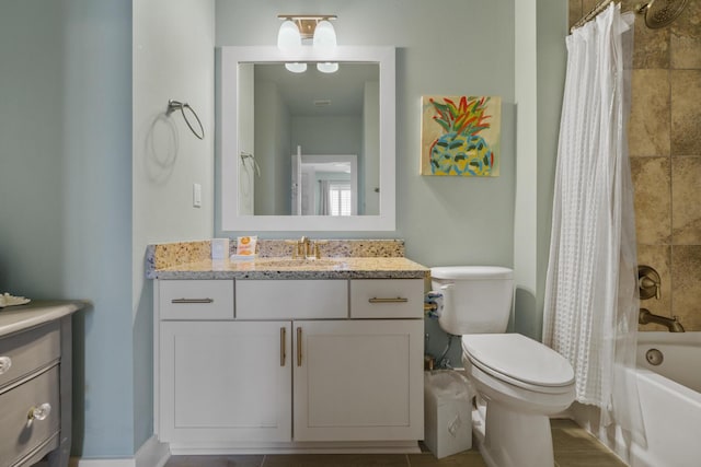full bathroom featuring toilet, vanity, and shower / bath combo with shower curtain