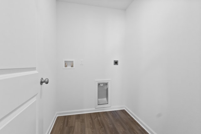 clothes washing area featuring washer hookup, hookup for an electric dryer, laundry area, dark wood-style flooring, and baseboards