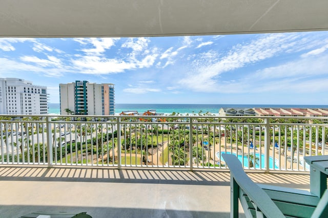balcony featuring a water view