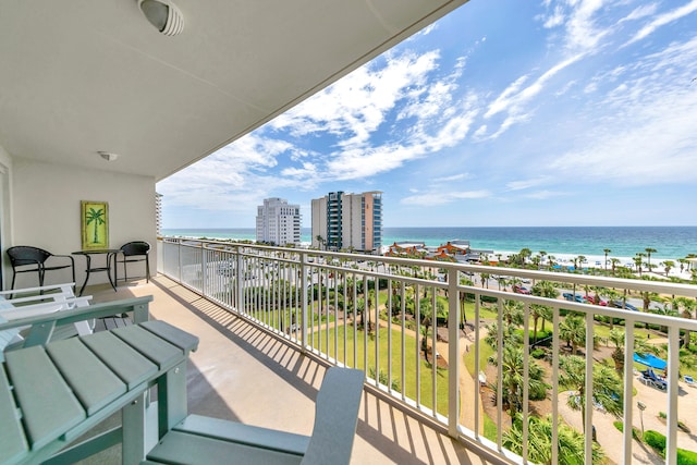 balcony featuring a water view