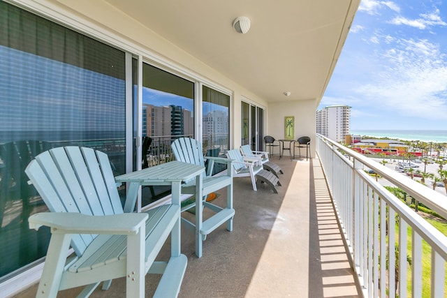balcony featuring a water view