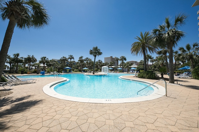 community pool with a patio