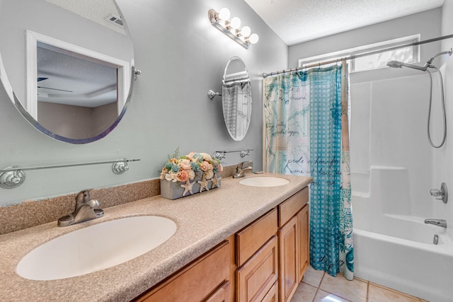 960 Valley Rd, Crestview, FL 32539 - full bathroom with a textured ceiling, shower / bath combination with curtain, a sink, and tile patterned flooring